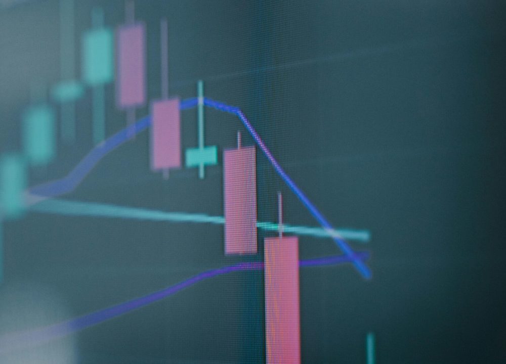 Close-up of a digital stock market chart showcasing analytics on a screen.